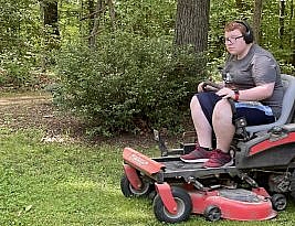 “dad…. josh is driving the lawn mower like a race car”